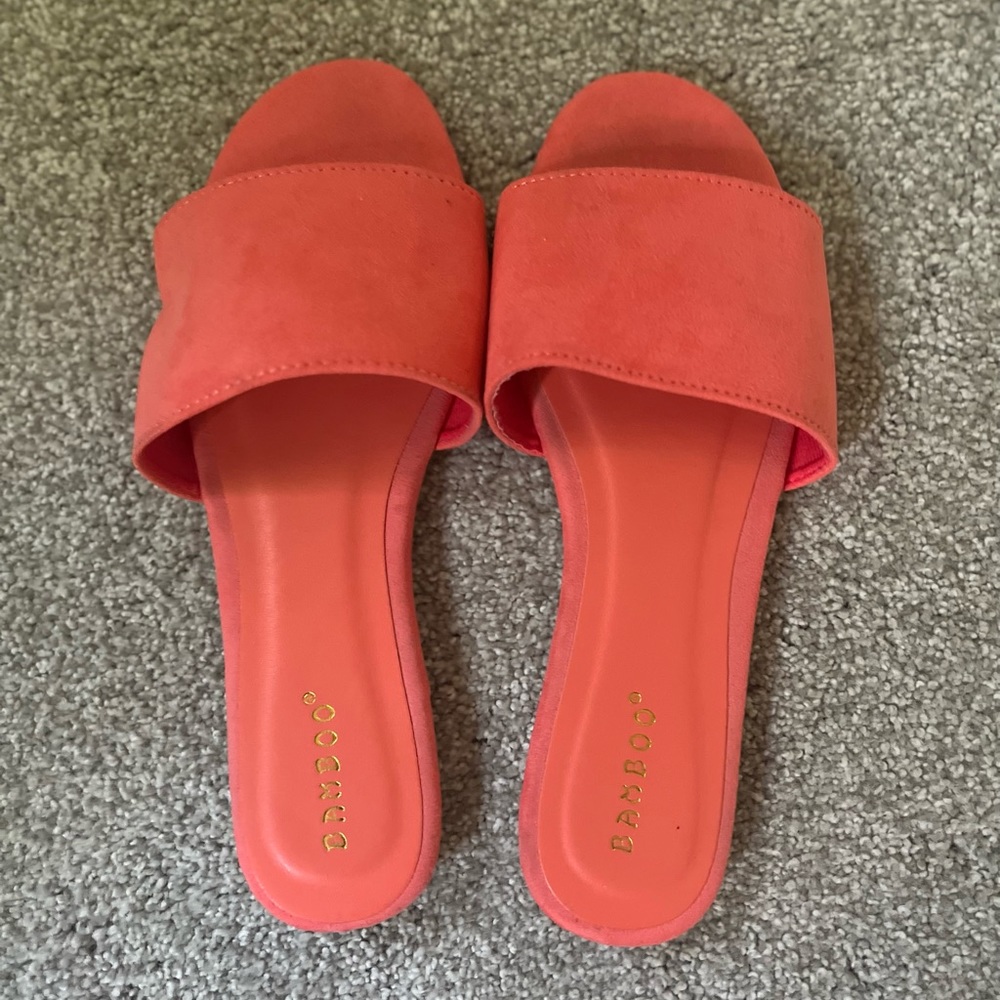 Coral colored flat slides